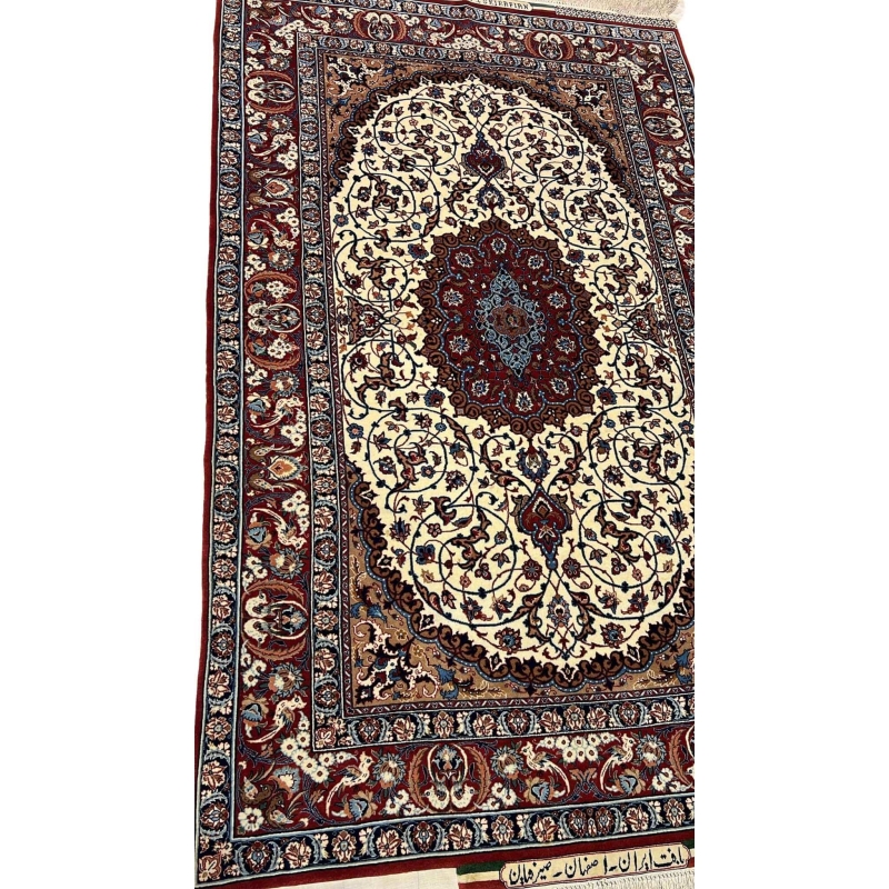 "Side view of a Seirafian Persian rug, displaying the detailed pattern, vibrant red tones, and high knot density typical of Isfahan rugs."