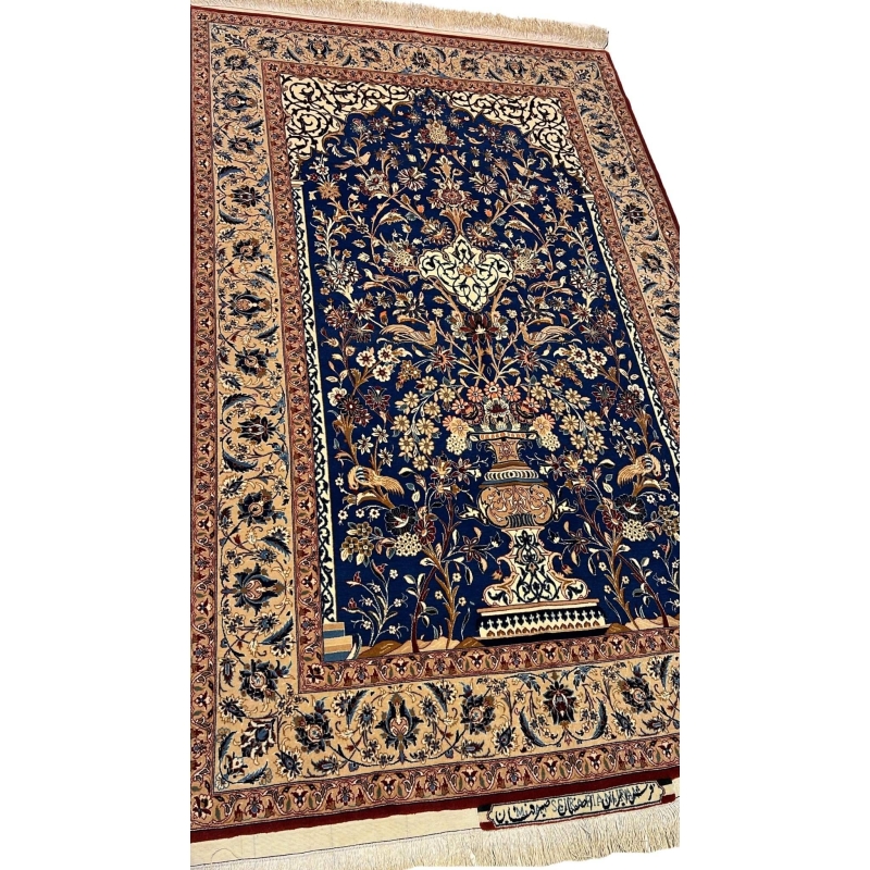 "Close-up of the detailed floral patterns on a hand-knotted silk and wool Seirafian rug by Master Mohammad Ali Seirafian."