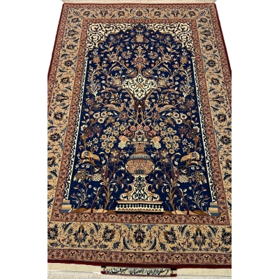 "Hand-knotted Seirafian Isfahan rug showcasing intricate floral designs, crafted from a blend of wool and silk."