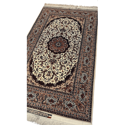 "Close-up of a fine Persian silk and wool carpet with medallion design, mastercrafted by Bagher Seirafian, showing rich colors and intricate knotting."