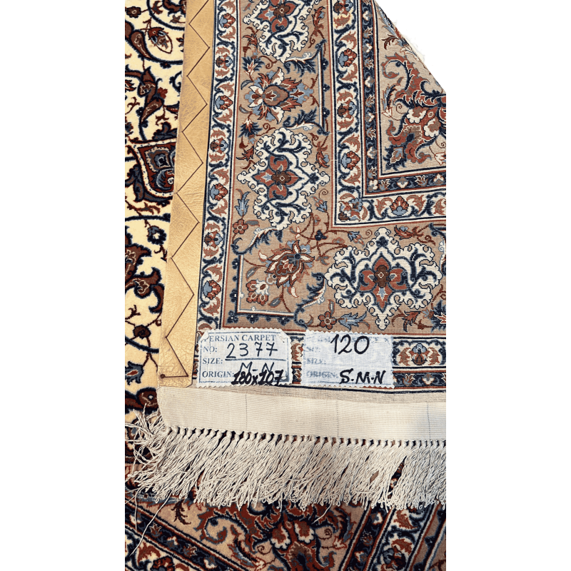 "Backside of a Master Bagher Seirafian hand-knotted Persian rug, showcasing fine knot craftsmanship with a silk warp and wool pile, made in Isfahan."