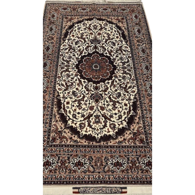 "Luxury Persian medallion rug by Master Bagher Seirafian, hand-knotted in Isfahan with silk and wool, featuring intricate floral and medallion patterns."
