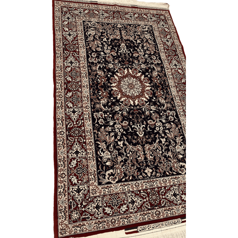 "Angled view of a hand-knotted Persian carpet by Master Bagher Seirafian, showcasing floral motifs and a classical Persian design."