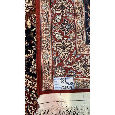"Backside of a Master Bagher Seirafian rug, showing fine knot craftsmanship with a silk warp and wool pile."