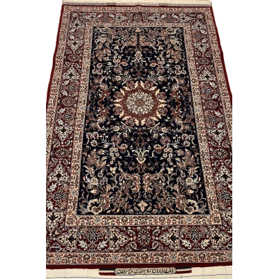 "Hand-knotted Seirafian Persian rug by Master Bagher Seirafian, featuring a classical floral design in burgundy and ivory, crafted from silk and wool in Isfahan."

