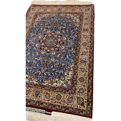 "Detailed close-up of the floral patterns on a Seirafian Persian rug, showcasing hand-knotted wool and silk craftsmanship from Isfahan, Iran."