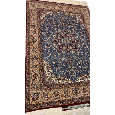 "Side view of a luxurious Seirafian Persian rug, emphasizing the fine handwoven silk and wool material and intricate patterning, crafted in Isfahan by Master Hassan Seirafian."