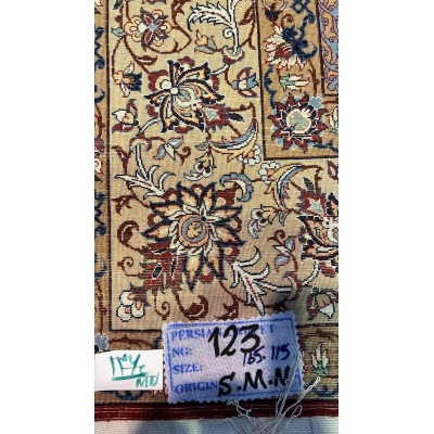 "Backside of a hand-knotted Seirafian Persian rug, crafted by Master Hassan Seirafian in Isfahan, displaying detailed knotwork and silk warp for premium durability."