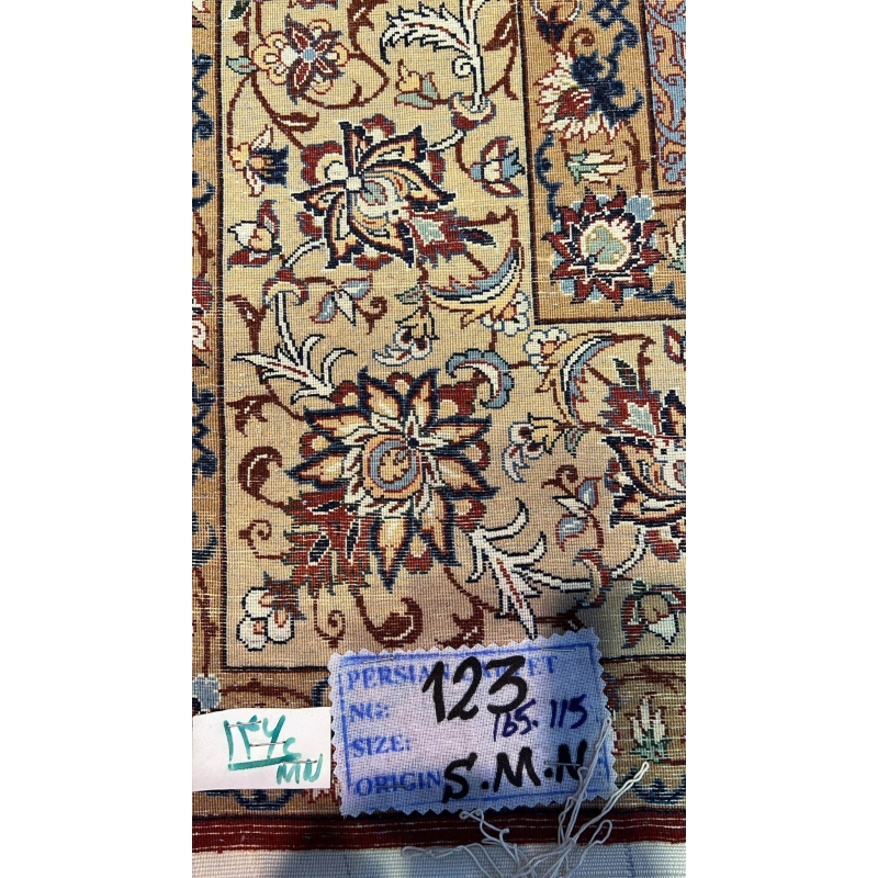 "Backside of a hand-knotted Seirafian Persian rug, crafted by Master Hassan Seirafian in Isfahan, displaying detailed knotwork and silk warp for premium durability."