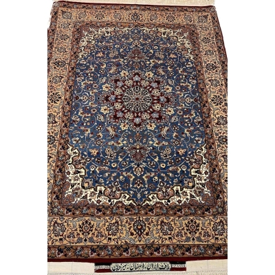 "Front view of an authentic Seirafian Persian rug with intricate floral and medallion design, handwoven with silk and wool in Isfahan by Master Hassan Seirafian."