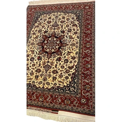 "Luxury Isfahan Seirafian floral rug with intricate medallion design, made from wool and silk, featuring traditional Persian craftsmanship."