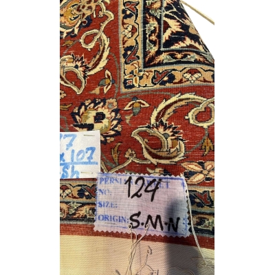 "Backside of an Ahmad Seirafian Persian rug, highlighting the fine knotting and silk warp for durability and luxury."