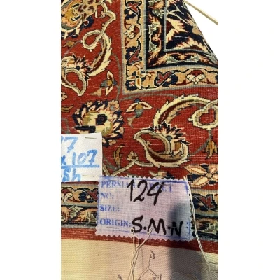 "Backside of an Ahmad Seirafian Persian rug, highlighting the fine knotting and silk warp for durability and luxury."