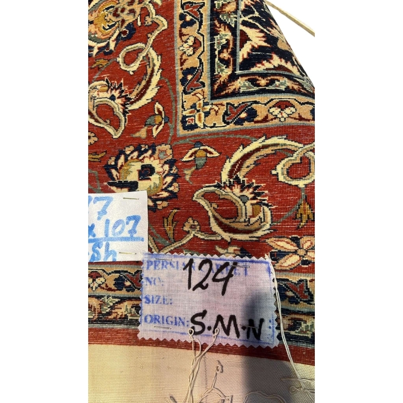 "Backside of an Ahmad Seirafian Persian rug, highlighting the fine knotting and silk warp for durability and luxury."