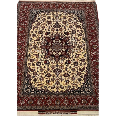 "Handcrafted Seirafian silk and wool rug with floral design, woven by Master Ahmad Seirafian in Isfahan."