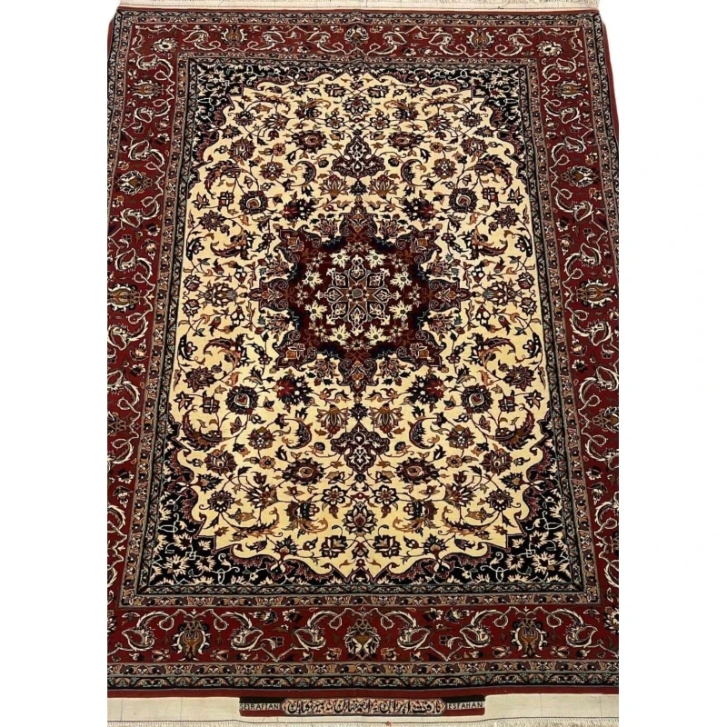 "Handcrafted Seirafian silk and wool rug with floral design, woven by Master Ahmad Seirafian in Isfahan."