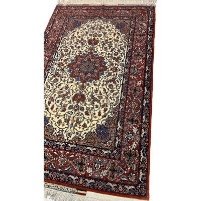 "Close-up of a luxurious Seirafian rug showcasing detailed knotting and natural dyed colors."