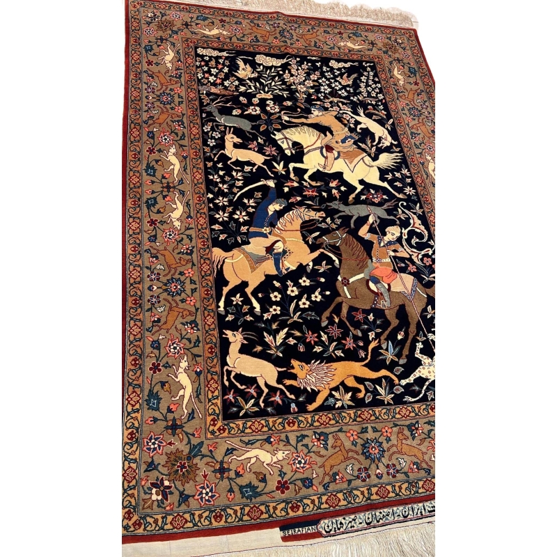 Full view of the 60-year-old Seirafian Persian rug with a hunting scene design, in excellent condition.