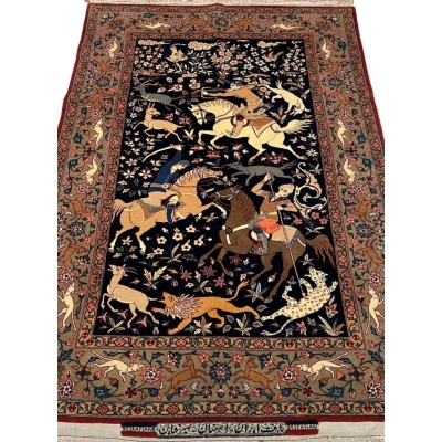 Close-up view of the Seirafian Hunting Scene rug, showcasing intricate hand-knotted silk and wool craftsmanship.