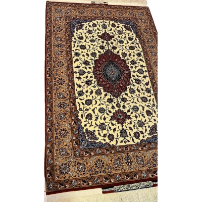"Angled view of a hand-knotted Seirafian rug featuring floral designs and a rich medallion pattern, crafted with silk and wool by Ali Reza Seirafian."