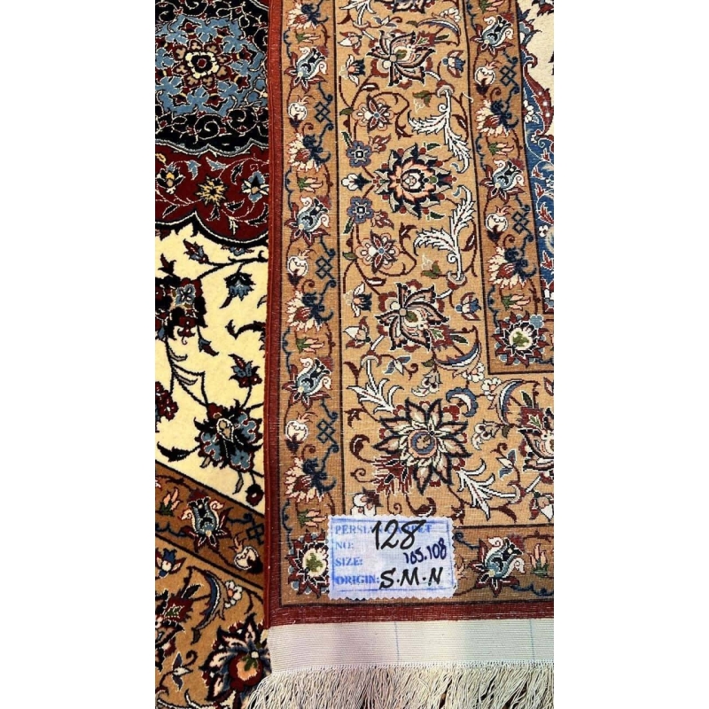 "Backside of a Seirafian Persian rug by Ali Reza Seirafian, showing the fine knotting craftsmanship and structure with silk warp and wool pile."