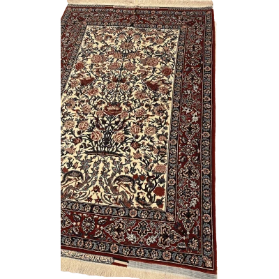 "Angled view of a hand-knotted Seirafian rug with a distinctive floral pattern and high knot density, crafted by Master Bagher Seirafian in Isfahan."