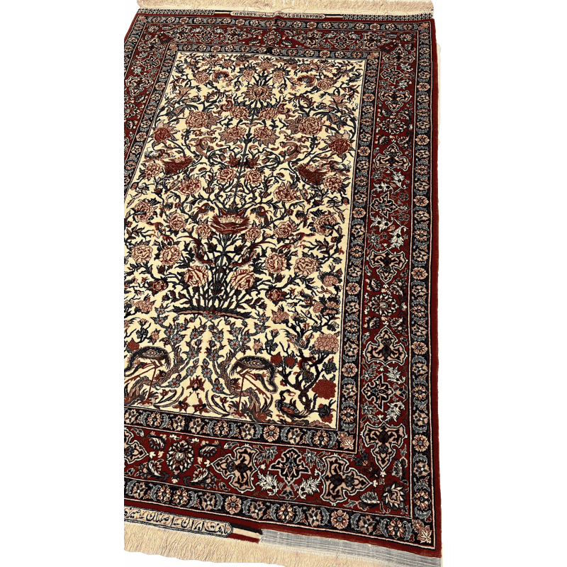 "Angled view of a hand-knotted Seirafian rug with a distinctive floral pattern and high knot density, crafted by Master Bagher Seirafian in Isfahan."