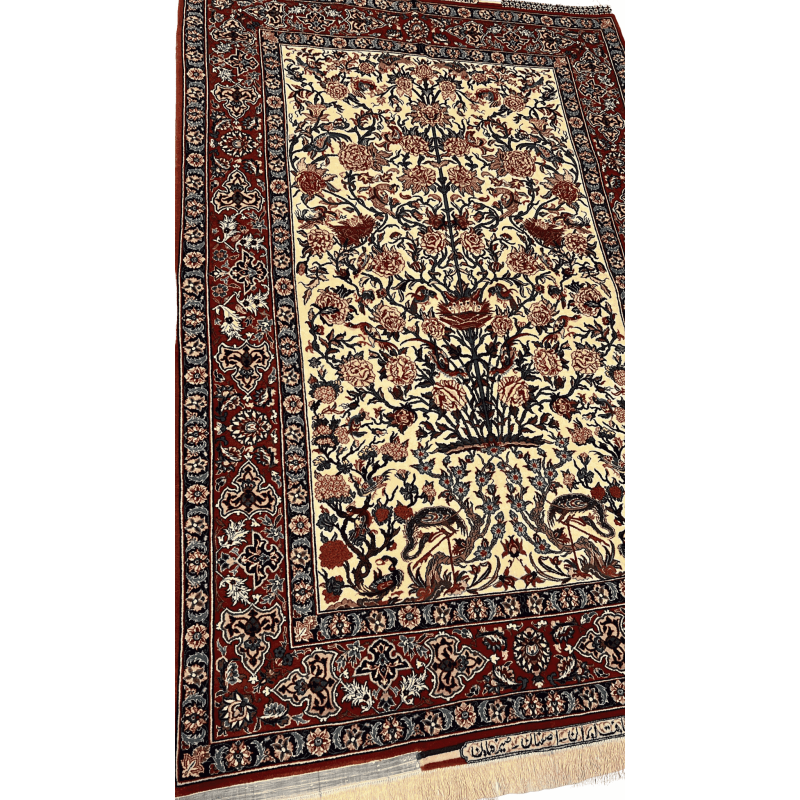 "Close-up of the intricate floral design on a Seirafian Persian rug by Master Bagher Seirafian, showcasing fine knotting and vibrant colors."