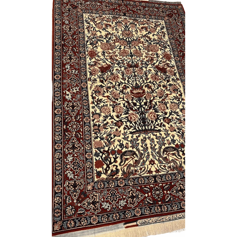 "Close-up of the intricate floral design on a Seirafian Persian rug by Master Bagher Seirafian, showcasing fine knotting and vibrant colors."