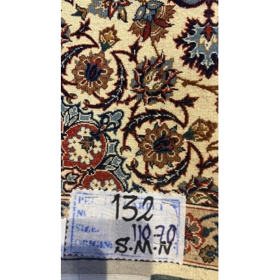 Backside view of the authentic small beige Seirafian rug, revealing fine knotting craftsmanship and silk foundation.