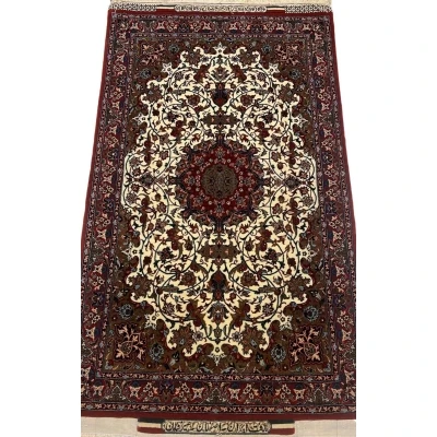 Fine small red and cream Seirafian Persian rug with intricate floral patterns.

