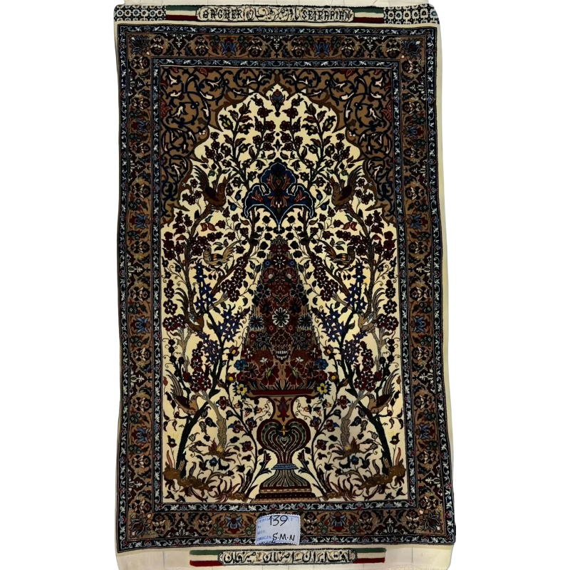 Luxurious Seirafian rug featuring intricate floral and bird patterns in vibrant colors.