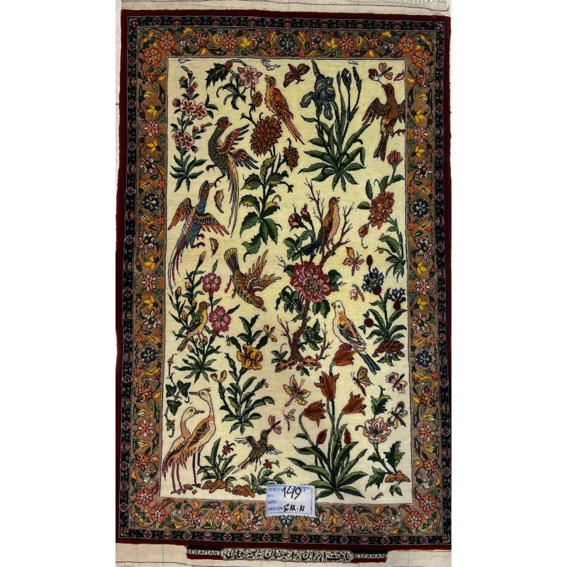 "Hand-knotted small Persian rug by Master Hassan Seirafian, 110x75 cm, featuring a floral and bird design in wool and silk."