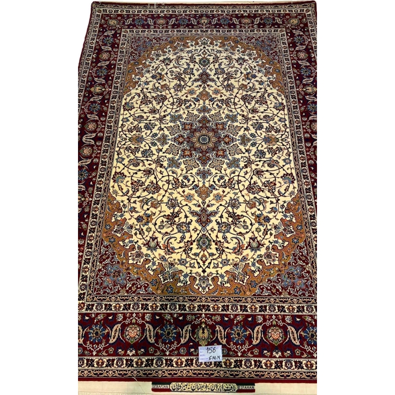 "Hand-knotted Isfahan rug by Seirafian featuring a medallion design with floral motifs."