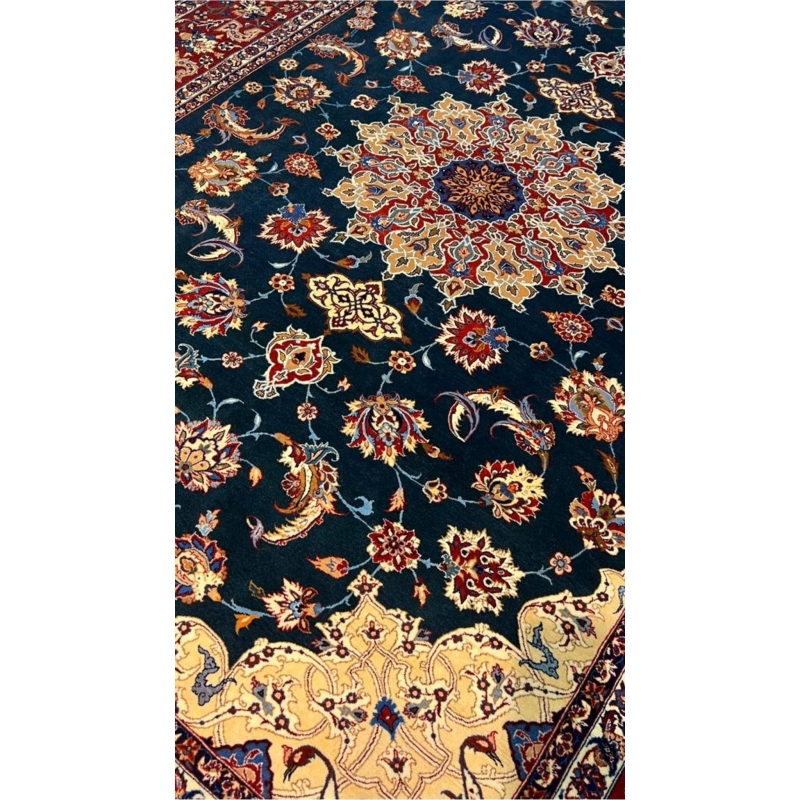 "50-year-old Persian rug featuring a medallion design and intricate floral patterns."