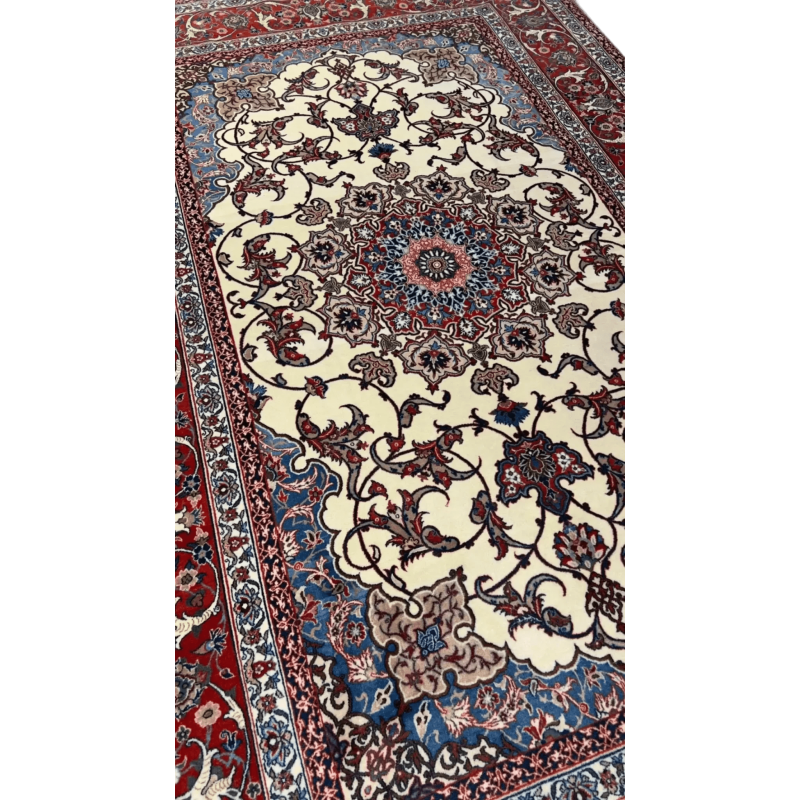 Close-up of the detailed medallion centerpiece on Master Bagher Seirafian Isfahan silk-wool rug