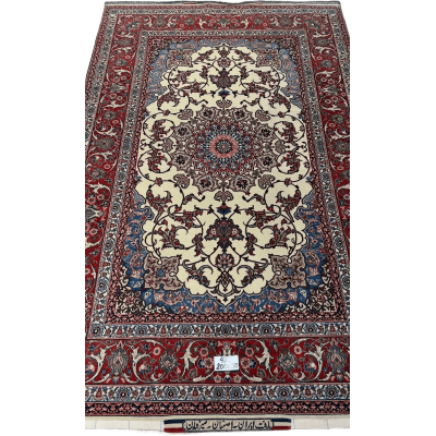 Angled view of the Master Bagher Seirafian Isfahan rug showcasing the elaborate border design