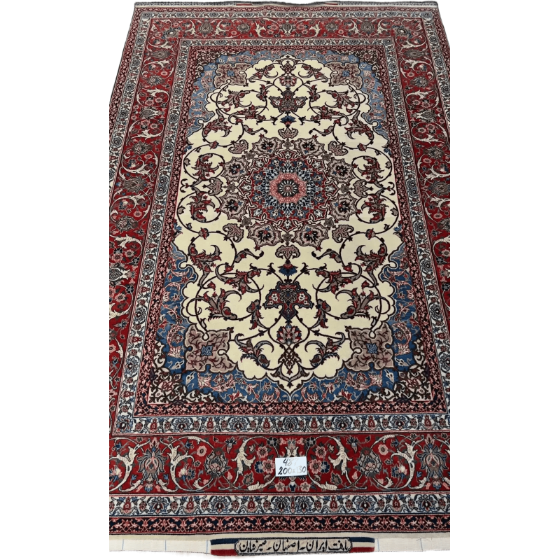 Angled view of the Master Bagher Seirafian Isfahan rug showcasing the elaborate border design