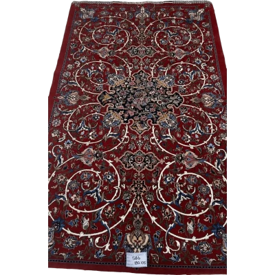  "Exquisite Isfahan Persian rug by master weaver Bagher Seirafian. Measuring 189 x 105 cm (approximately 6.2 x 3.4 feet) with a thickness of 5 mm and a remarkable knot density of 1,210,000 knots per square meter. This handcrafted masterpiece features intricate floral designs on a deep red background, with a luxurious wool and silk pile and a silk warp. This new rug from Isfahan, Iran, weighs 5 kg and is an exclusive piece."