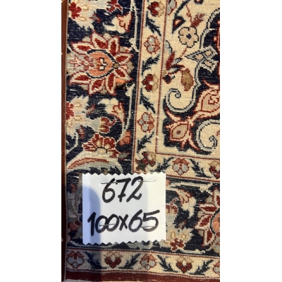 Backside view of the Seirafian rug, highlighting the fine silk warp and knot density.