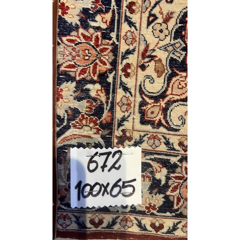 Backside view of the Seirafian rug, highlighting the fine silk warp and knot density.