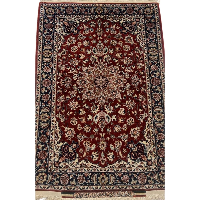 Semi-antique small Seirafian black and red Persian rug showcasing intricate floral designs and bold colors.