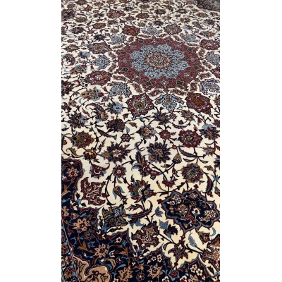 "Luxurious Seirafian Persian carpet made with silk warp and wool-silk pile, measuring 13x9.8 feet."