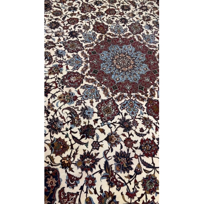 "Vintage Seirafian rug, hand-knotted in Isfahan, Iran, with a 45-year-old heritage."