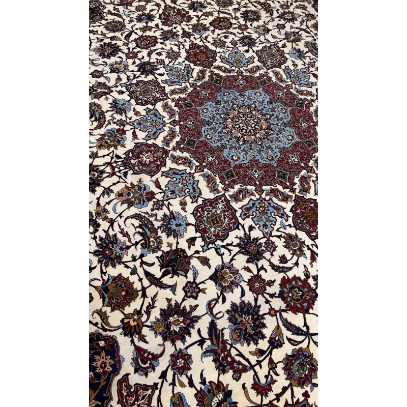 "Vintage Seirafian rug, hand-knotted in Isfahan, Iran, with a 45-year-old heritage."