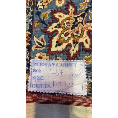 Backside view of the Hassan Seirafian Pictorial rug, showcasing the high knot density and silk warp craftsmanship.