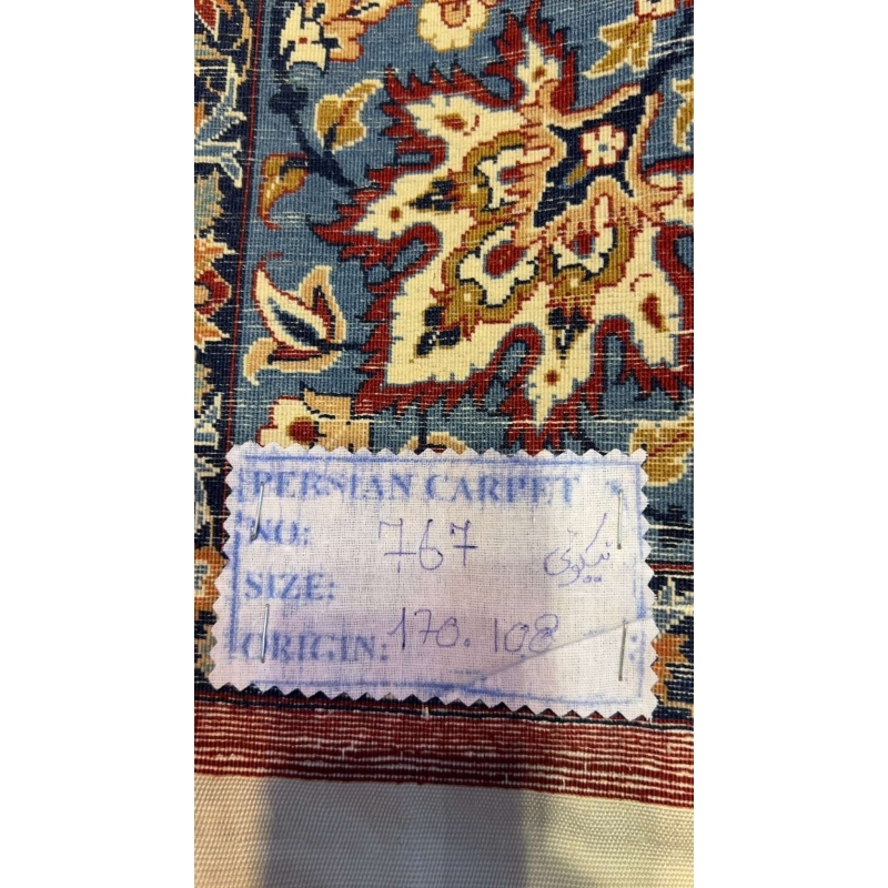 Backside view of the Hassan Seirafian Pictorial rug, showcasing the high knot density and silk warp craftsmanship.