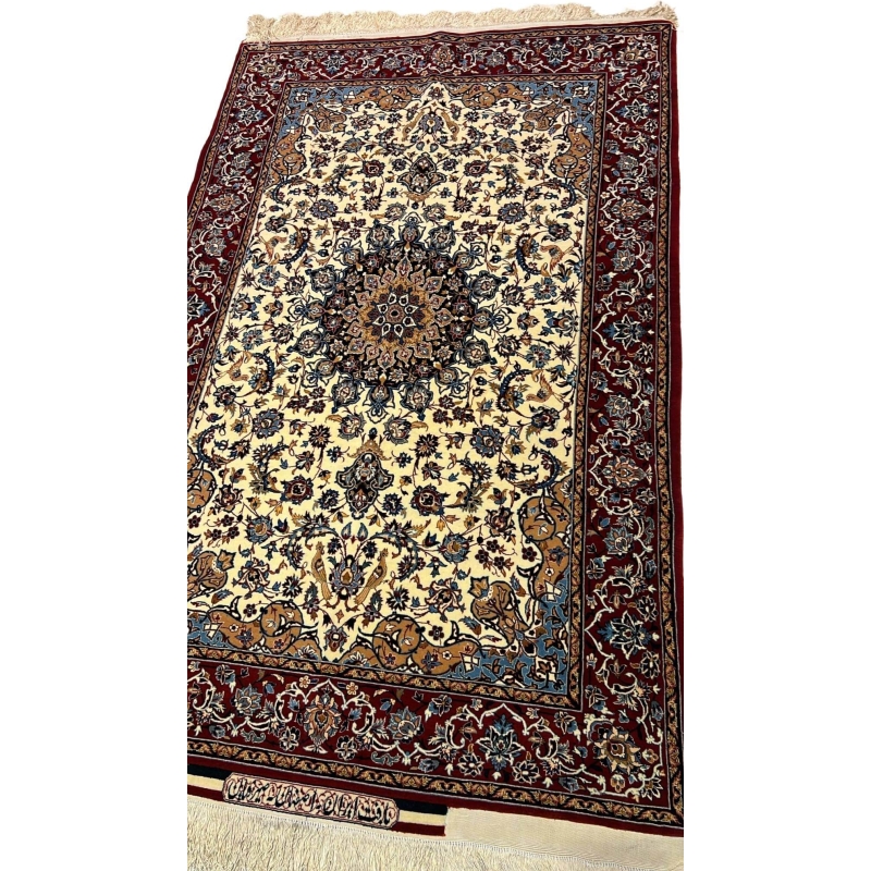 "Exquisite Isfahan Seirafian rug in shades of beige and burgundy, handwoven with wool and silk for luxury and durability."