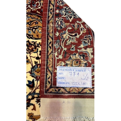 "Backside of a handwoven Seirafian Persian rug, showcasing the detailed silk warp and craftsmanship from Isfahan, Iran."
