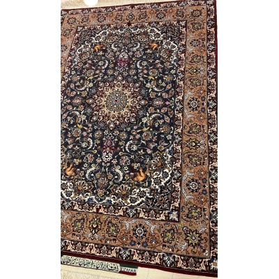 "Luxury Persian rug by Master Hassan Seirafian, crafted from wool and silk with natural dyes, displaying exquisite craftsmanship."